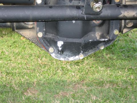 1994 Ford Bronco - The rear differential housing shows some wear and tear around the cover bolts.