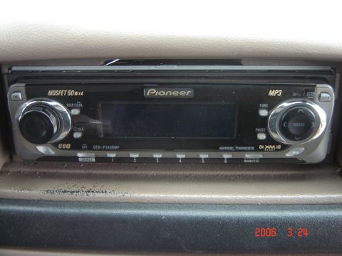 1993 Ford Bronco - Close-up of a Pioneer car stereo, model DEH-P7400MP, with MP3 playback.