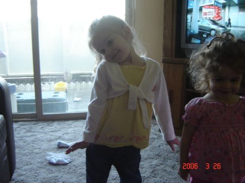 1993 Ford Bronco - Two young girls are in a room with a television displaying a car advertisement.
