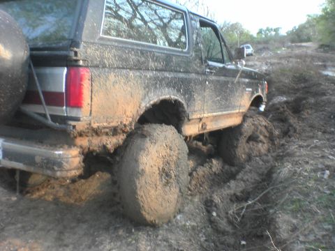 1991 Ford Bronco - By the time i frinnaly got a friend out there i had dug the 36's pretty deep tryin to rock it out, but got it wit a f250's big tug.