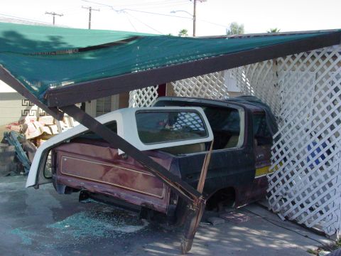 1979 Ford Bronco - This Ford Bronco appears to be undergoing repairs or restoration, with its top removed and windows shattered.