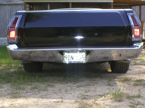 1973 Ford Ranchero - Rear view of a 1973 Ford Ranchero showing its chrome bumper and taillights.