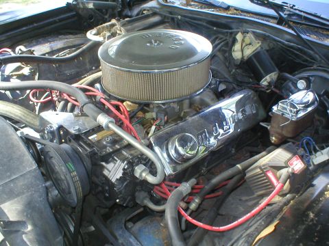 1973 Ford Ranchero - Close-up view of a vehicle's engine bay, showing the air filter and valve covers.