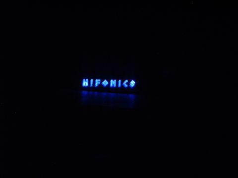 1994 Ford Thunderbird - The HIFONICS logo glows blue in the dark.