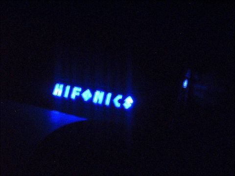 1994 Ford Thunderbird - Blue illuminated text reading "HIFONICS" is visible against a dark background.