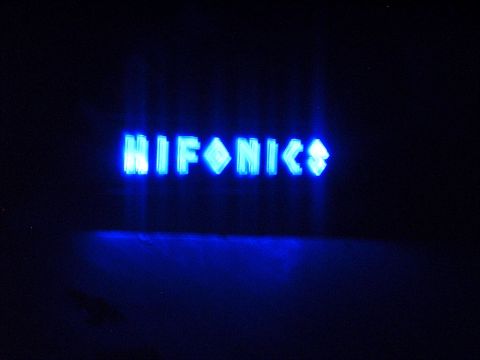 1994 Ford Thunderbird - The HIFONICS logo glows in blue neon against a dark background.