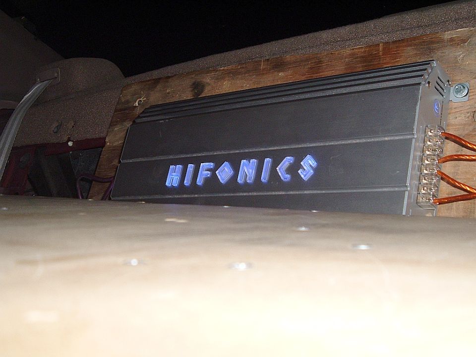 Car amplifier with blue illuminated 'HIFONICS' logo