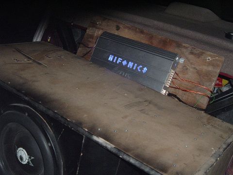 1994 Ford Thunderbird - Car audio amplifier and subwoofer box installation.