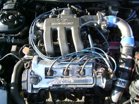1996 Ford Probe - Close-up of a Ford V6 engine, likely modified with an aftermarket intake.