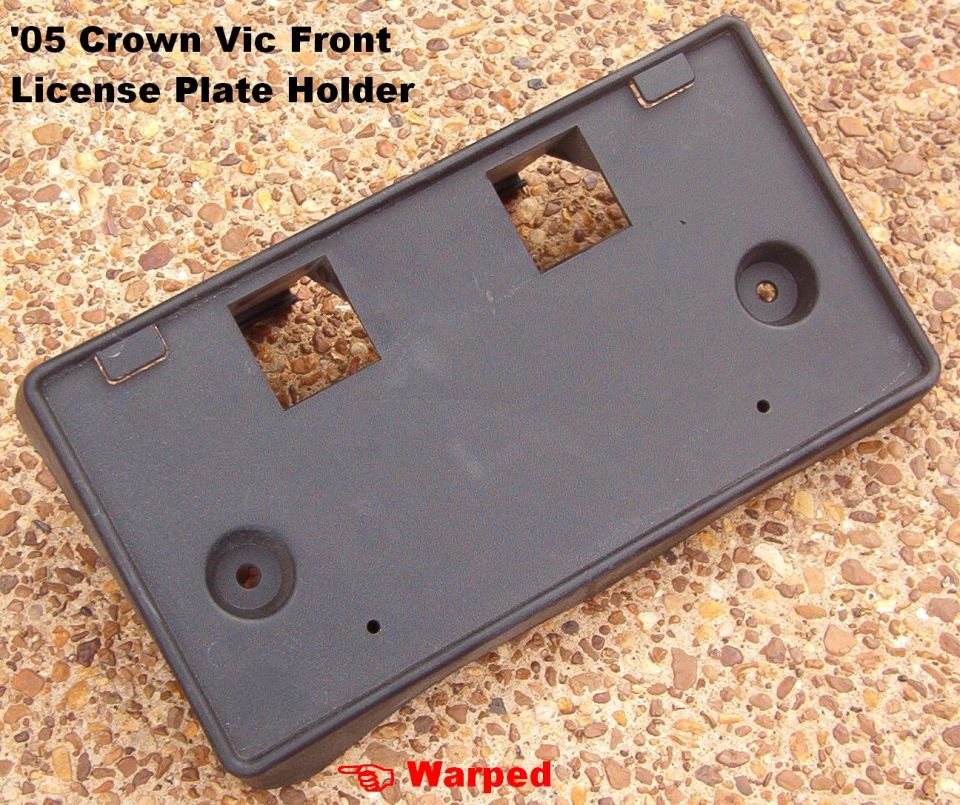 Front License Plate Holder possibly from a 2005 P71