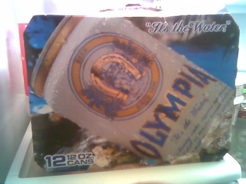 1991 Ford Explorer - A display box for Olympia beer, a large can and the slogan "It's the Water" is shown.