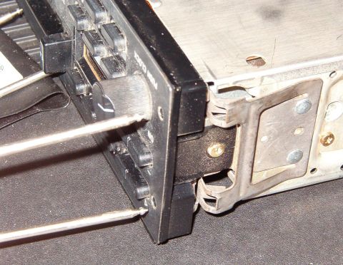 1983 Ford Bronco - It's easy to identify this style of mounting catch by the 2 holes on each side of the radio face, but read this first: [url=http://www.supe…
