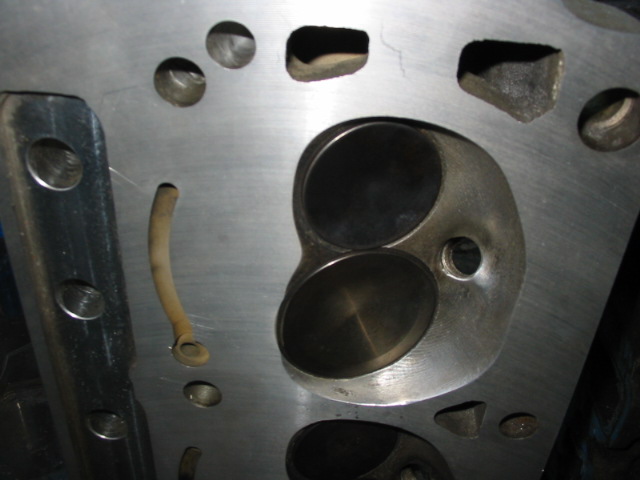 Engine cylinder head with two valve openings