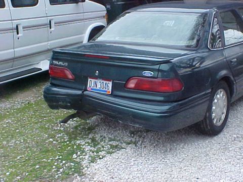 1995 Ford Taurus - Overall view of damage from being 1st car in a 4 car pileup...
