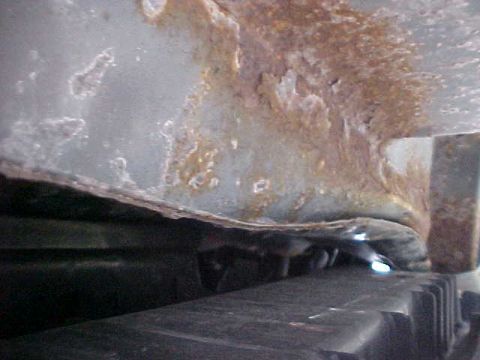 1995 Ford Taurus - underneath car looking towards the driver side of the car