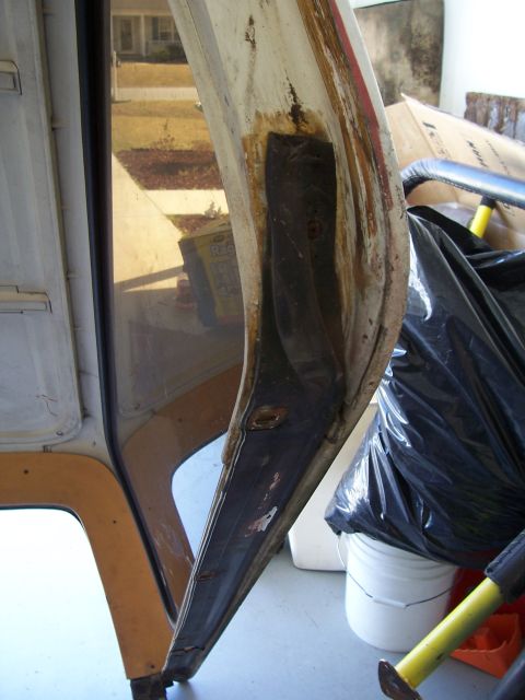 1978 Ford Bronco - Close-up view of the interior door frame, showing wear and tear.