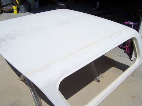 1978 Ford Bronco - A white fiberglass roof panel is shown, likely for a vehicle restoration project.