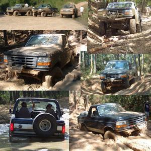 1993 Ford Bronco - Several Ford Broncos navigate a challenging off-road course, covered in mud.