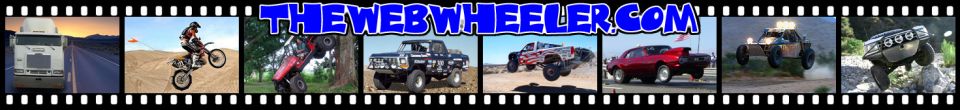 Black pickup truck with lifted suspension and off-road tires