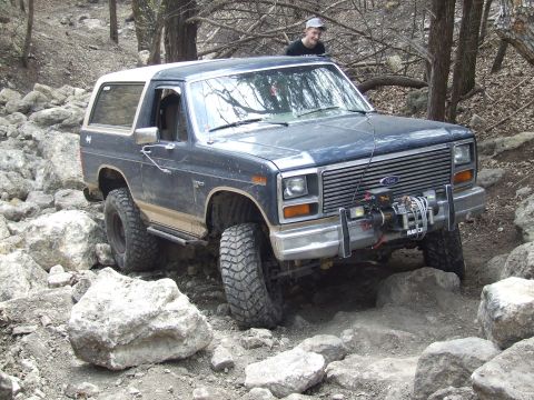 1986 Ford Bronco - This 1986 Ford Bronco tackles a challenging rocky terrain.
