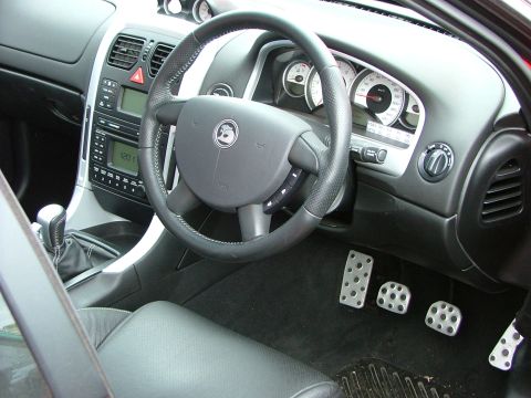 2001 Ford Fiesta - Interior view of a car, showing the dashboard, steering wheel, and pedals.