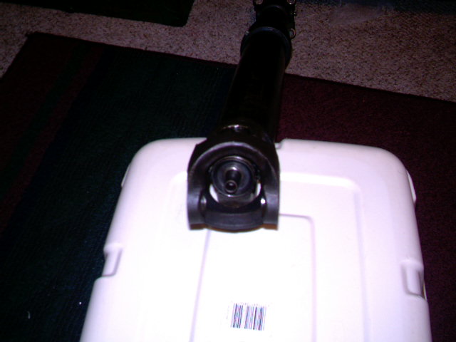 Driveshaft with U-joint on a white container