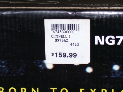 1992 Ford Bronco - A close-up of a product's packaging shows a price tag with item details and cost.