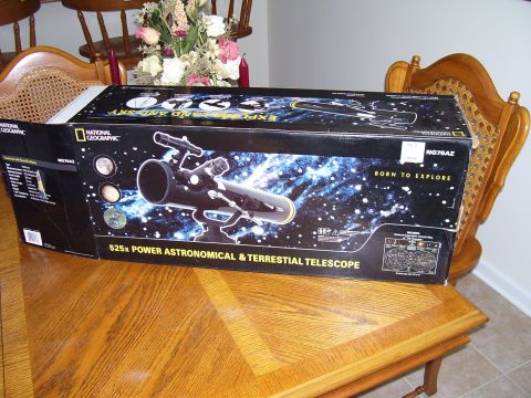 1992 Ford Bronco - Box for a National Geographic telescope is shown on a wooden table.