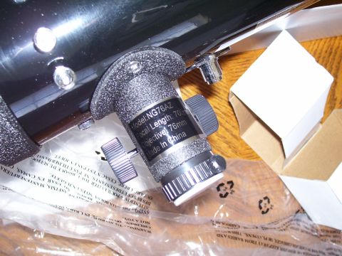 1992 Ford Bronco - Close-up of a telescope's focuser assembly, showing its model number and specifications.