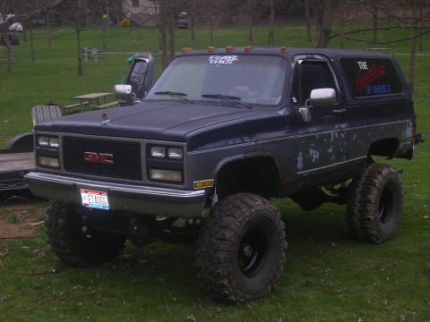 1989 GMC Jimmy - This 1989 GMC Jimmy features a lifted suspension and large off-road tires, giving it a stance.