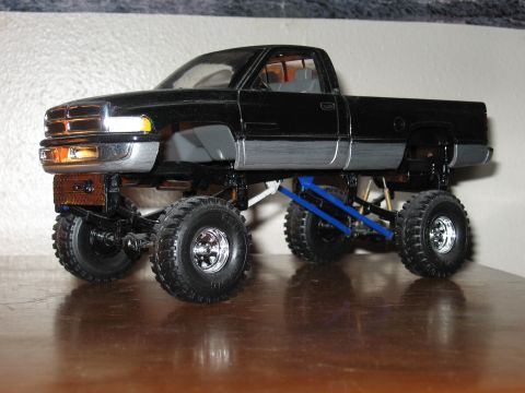 1977 Ford F-150 - This is a model of a pickup truck with a custom lifted suspension and oversized tires.