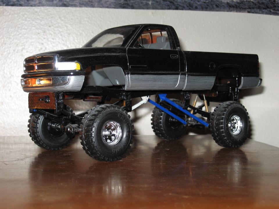 Model truck with lifted suspension and large tires