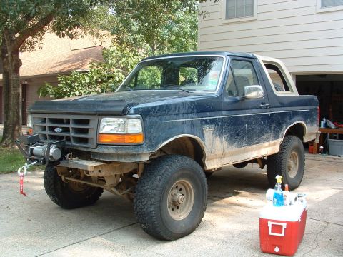 1993 Ford Bronco - This 1993 Ford Bronco features a winch and lifted suspension, ready for off-road adventures.