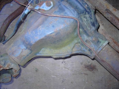 1991 Ford Bronco - A close-up view of a vehicle's differential housing, showing some wear and a visible part number.
