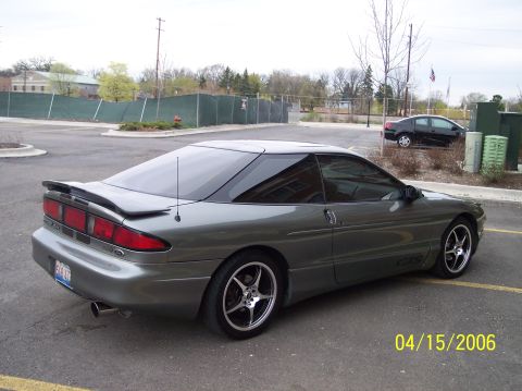 1995 Ford Probe - 1995 Ford Probe coupe in a parking lot.