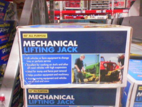 1990 Ford Bronco - The box for a mechanical lifting jack shows images of farm and off-road vehicles.
