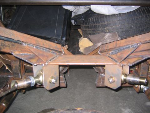 1969 Ford Mustang - Close-up view of custom fabricated rear suspension components, likely for a modified vehicle.