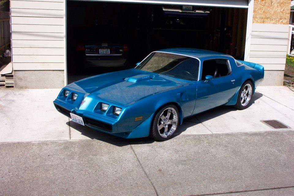 Blue 1979 Pontiac Trans Am parked in driveway