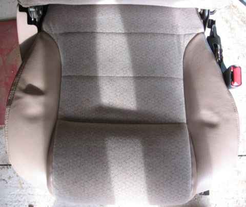 1993 Ford Thunderbird - Close-up of a car's interior seat, showing fabric pattern and side bolster.