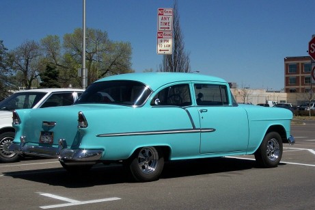 1972 Ford Ranchero - This turquoise 1955 Chevrolet Bel Air is seen from a 3q-front angle, with another vehicle parked alongside it.