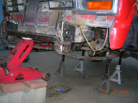 1985 Ford Bronco - leaf spring attached temporary. lt side.