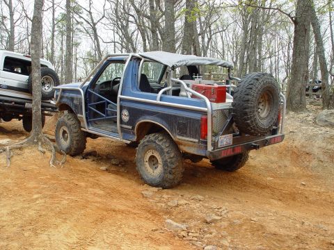 1996 Ford Bronco - This heavily modified SUV is equipped for off-road adventures, a custom roll cage and external storage.