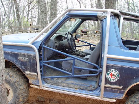 1996 Ford Bronco - This 1996 Ford Bronco is equipped with a full roll cage and off-road tires for trail use.