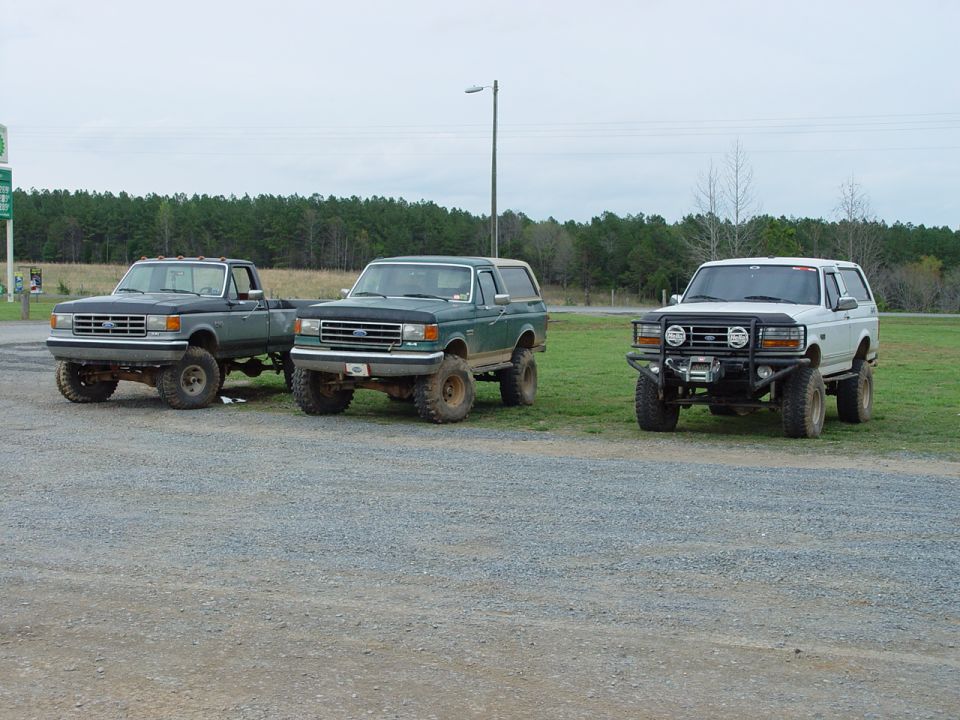 Green 1992 Ford Bronco 3/4 front view with lifted suspension