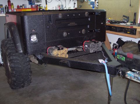2003 Jeep TJ - Custom trailer hitch assembly for a Jeep, a spare tire carrier and battery mounts.