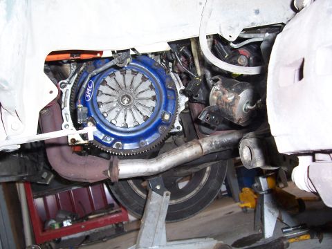 1996 Ford Probe - Close-up view of a blue SPEC clutch assembly and associated transmission components, likely during a repair or upgrade.