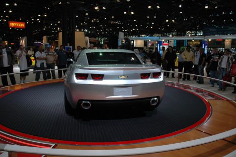 2005 Ford Mustang - Rear view of a silver Chevrolet Camaro concept car at an auto show.