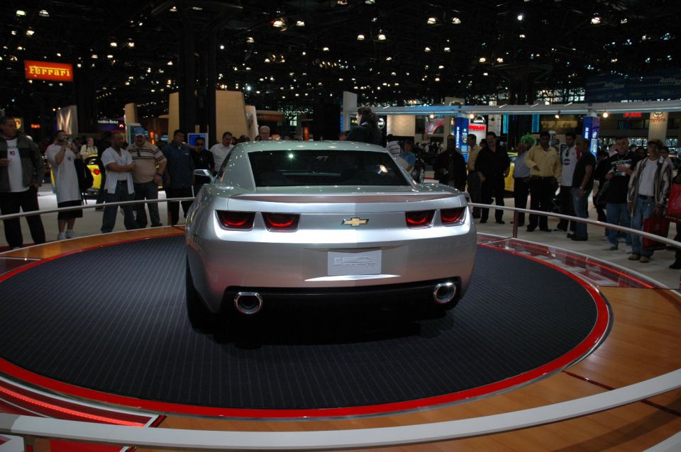 Silver Chevrolet Camaro concept car rear view on display turntable