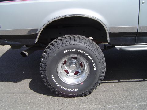 1989 Ford Bronco - Close-up of the rear tire and fender flare on a 1989 Ford Bronco.