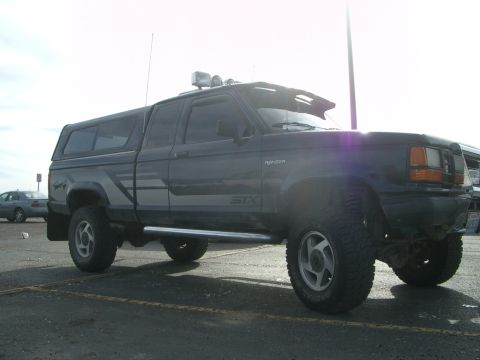 1992 Ford Ranger - This modified 1992 Ford Ranger STX features a camper shell and off-road upgrades.